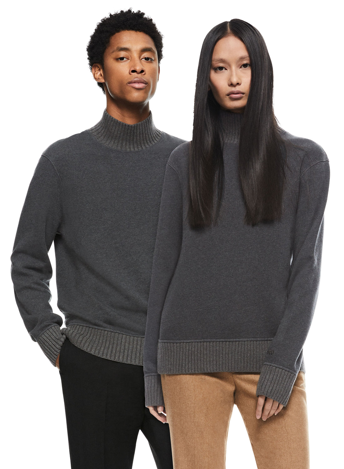 Man & Woman in Charcoal Turtleneck Sweater with Knit Trim