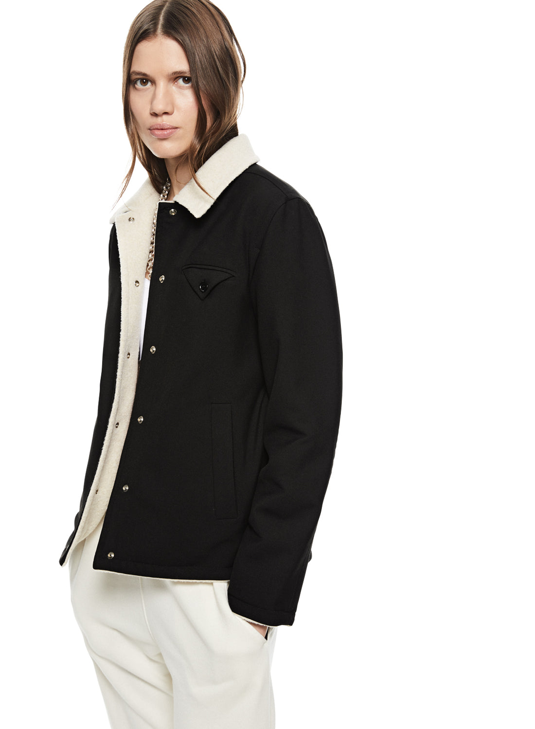 Side of Women's Black Reversible Coaches Jacket